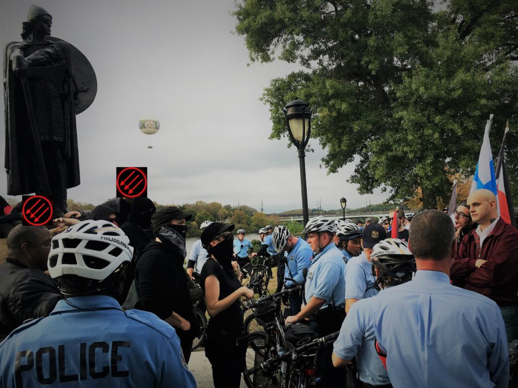 Antifa and skinheads face off by the viking statue in 2017.